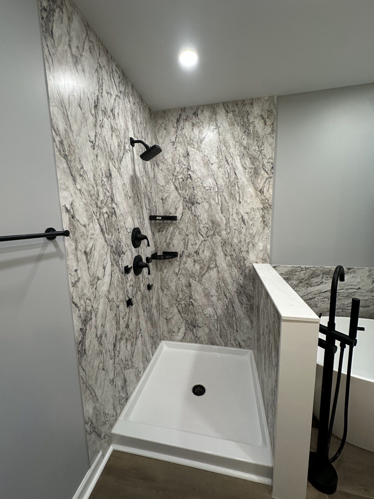 Stone-look shower wall surround sample, Concord NC — (704) 743-3582