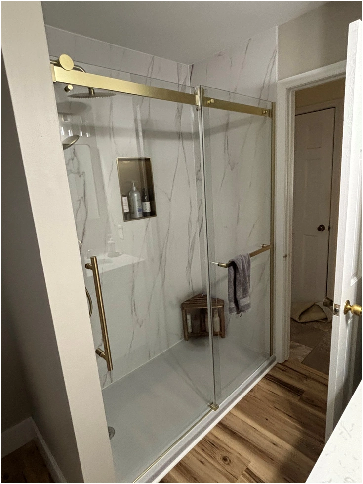 glass walk in shower with recessed niche remodel by premier hds 