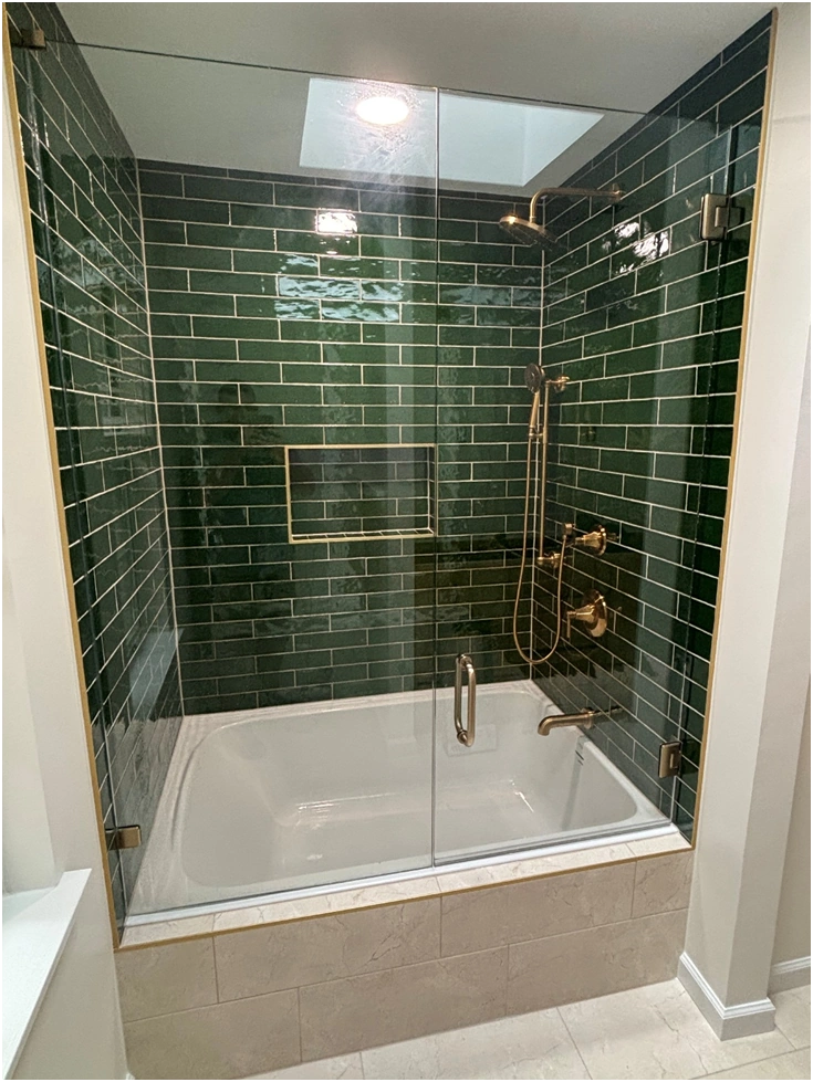 green subway tile walk in shower remodel by premier hds
