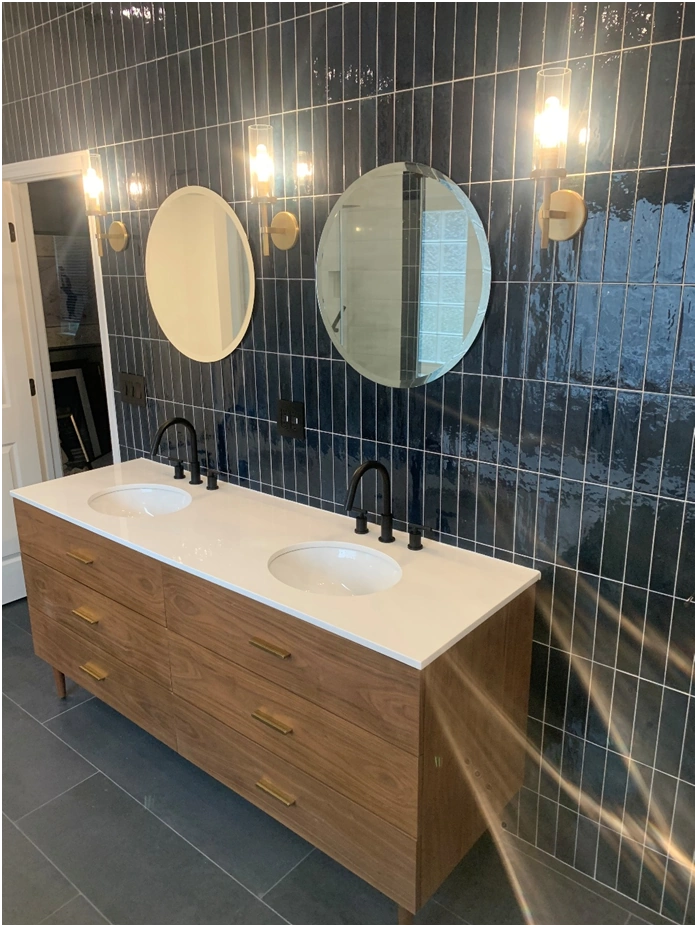 modern double vanity bathroom remodel with blue tile accent wall by premier hds